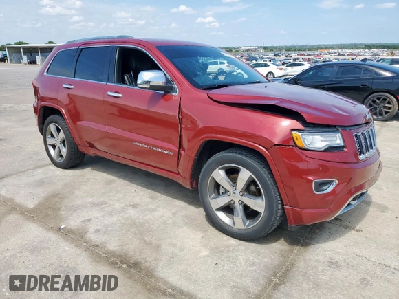 2015 Jeep Grand Cherokee Overland with VIN 1C4RJECG3FC686536, listed as a Copart auction lot 61058215 with 132,282 mi miles and Salvage title. Bid and sale history available at DreamBid. Image 4.