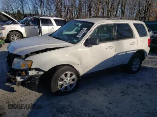 2011 Mazda Tribute Sport with VIN 4F2CY9C74BKM05014, listed as a Copart auction lot 87354744 with Not Provided miles and Non Repairable. Bid and sale history available at DreamBid. Image 1.