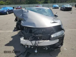2023 Lucid Air Pure z VIN 50EA1PFA8PA007207, wystawiony jako Copart lot #61214904 z przebiegiem 2958 mil mil oraz Szkody całkowita. Historia ofert i sprzedaży dostępna na DreamBid. Obrazek 5.