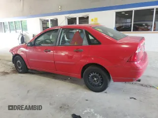 2007 Ford Focus S z VIN 1FAFP34N17W232021, wystawiony jako Copart lot #59553335 z przebiegiem 172 576 mil mil oraz Czysty tytuł • Clean title. Historia ofert i sprzedaży dostępna na DreamBid. Obrazek 2.