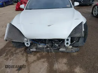 2012 Tesla Model S Performance with VIN 5YJSA1DP4CFP02346, listed as a IAAI auction lot 41642201 with Not Provided miles. Bid and sale history available at carsss.com. Image 6.