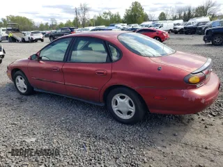 1997 Ford Taurus GL z VIN 1FALP52U4VG234295, wystawiony jako Copart lot #51112714 z przebiegiem 118 005 mil mil oraz Szkody całkowita. Historia ofert i sprzedaży dostępna na DreamBid. Obrazek 2.
