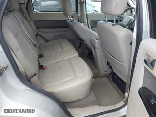 2009 Ford Escape Hybrid with VIN 1FMCU49319KA88009, listed as a IAAI auction lot 42065410 with 239,319 mi miles. Bid and sale history available at carsss.com. Image 8.