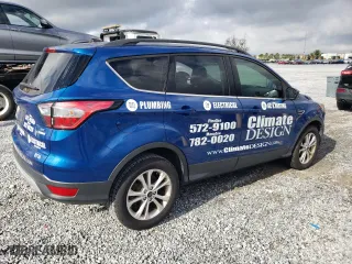 2018 Ford Escape SE with VIN 1FMCU0GD3JUC67441, listed as a Copart auction lot 86274134 with 101,667 mi miles and Salvage Title. Bid and sale history available at carsss.com. Image 3.