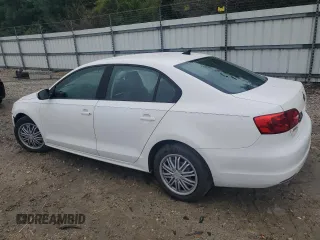 2014 Volkswagen Jetta SE with VIN 3VWD17AJ5EM365810, listed as a Copart auction lot 60676755 with 119,975 mi miles and Salvage title. Bid and sale history available at DreamBid. Image 2.