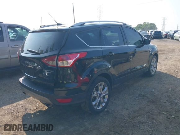 2014 Ford Escape Titanium with VIN 1FMCU9J93EUD60149, listed as a IAAI auction lot 39837388 with 154,880 mi miles. Bid and sale history available at carsss.com. Image 4.