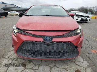 2021 Toyota Corolla Hybrid LE with VIN JTDEAMDE9MJ003897, listed as a Copart auction lot 47861925 with 64,693 mi miles and Salvage Title. Bid and sale history available at carsss.com. Image 5.