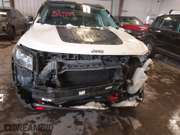 2018 Jeep Compass Trailhawk with VIN 3C4NJDDB2JT328269, listed as a IAAI auction lot 41597957 with 66,789 mi miles and . Bid and sale history available at carsss.com. Image 6.