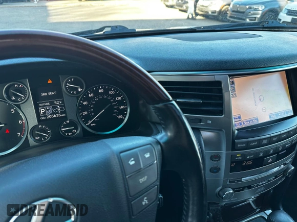 2013 Lexus LX 570 with VIN JTJHY7AXXD4091614, listed as a Copart auction lot 82096184 with 205,635 mi miles and Clean Title. Bid and sale history available at DreamBid. Image 8.