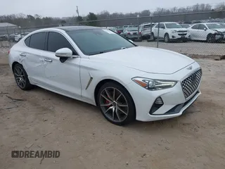 2020 Genesis G70 3.3T with VIN KMTG34LEXLU060919, listed as a IAAI auction lot 41619579 with 69,859 mi miles. Bid and sale history available at carsss.com. Image 1.