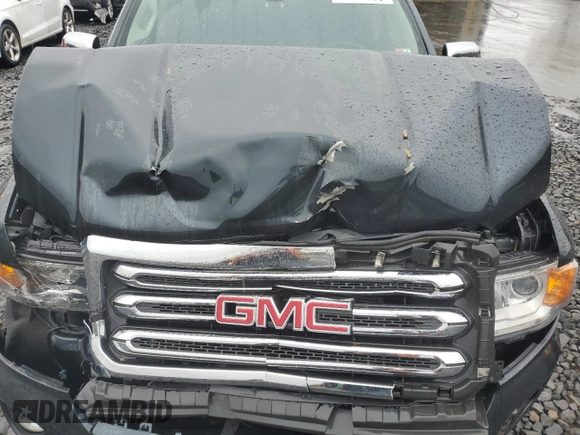 2018 GMC Canyon 4WD SLT z VIN 1GTG6DEN9J1104099, wystawiony jako Copart lot #56195235 z przebiegiem 115 308 mil mil oraz Szkoda całkowita • Salvage title. Historia ofert i sprzedaży dostępna na DreamBid. Obrazek 11.