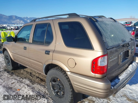 2002 Isuzu Rodeo with VIN 4S2DM58W824320291, listed as a IAAI auction lot 41385761 with 177,441 mi miles. Bid and sale history available at carsss.com. Image 3.