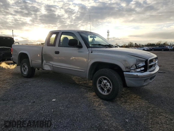 1999 Dodge Dakota SLT with VIN 1B7GG22Y3XS275370, listed as a Copart auction lot 81568994 with 241,945 mi miles and Salvage Title. Bid and sale history available at DreamBid. Image 4.