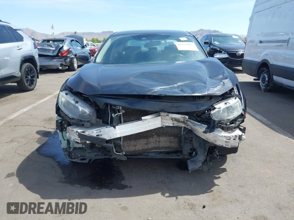 2020 Honda Civic LX с VIN 19XFC2F63LE210936, выставлен на аукционе IAAI как лот 42163809 с пробегом 89 955 миль миль и . История ставок и продаж доступна на DreamBid. Изображение 6.