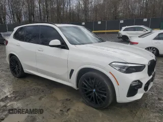 2020 BMW X5 M50i with VIN 5UXJU4C02L9C46464, listed as a Copart auction lot 43455805 with 89,337 mi miles and Salvage Title. Bid and sale history available at DreamBid. Image 4.