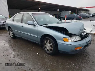 1994 Honda Accord EX w/Leather with VIN 1HGCD5657RA119657, listed as a IAAI auction lot 41528165 with 119,458 mi miles. Bid and sale history available at carsss.com. Image 1.