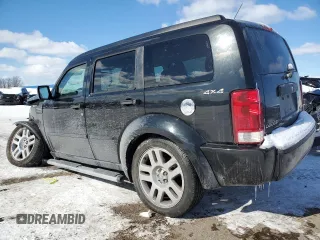 2010 Dodge Nitro Heat with VIN 1D4PU4GK4AW165374, listed as a Copart auction lot 45667655 with 142,086 mi miles and Salvage title. Bid and sale history available at DreamBid. Image 2.