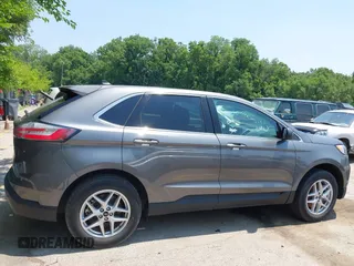 2024 Ford Edge SEL z VIN 2FMPK4J98RBA88719, wystawiony jako IAAI lot #42465705 z przebiegiem 26 101 mil mil oraz . Historia ofert i sprzedaży dostępna na DreamBid. Obrazek 14.