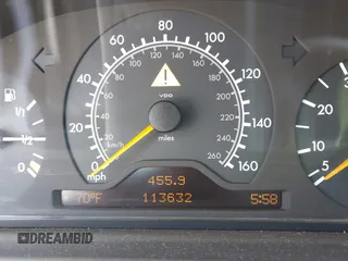 1998 Mercedes-Benz E-Class with VIN WDBJF65F5WA702626, listed as a IAAI auction lot 42014815 with 113,632 mi miles. Bid and sale history available at carsss.com. Image 7.