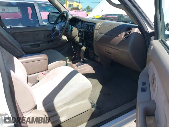 2001 Toyota Tacoma PreRunner z VIN 5TEGN92N91Z852586, wystawiony jako IAAI lot #42299321 z przebiegiem 233 111 mil mil oraz . Historia ofert i sprzedaży dostępna na DreamBid. Obrazek 5.