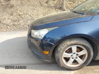 2014 Chevrolet Cruze 1LT with VIN 1G1PC5SB1E7302745, listed as a IAAI auction lot 42142048 with 160,000 mi miles and . Bid and sale history available at DreamBid. Image 12.