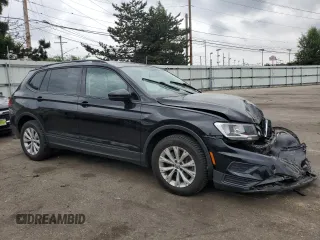 2018 Volkswagen Tiguan S with VIN 3VV0B7AX3JM055587, listed as a Copart auction lot 59751225 with 66,779 mi miles and Salvage title. Bid and sale history available at DreamBid. Image 4.