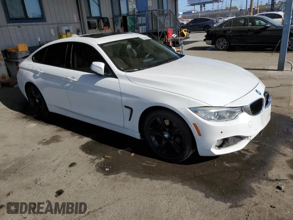 2015 BMW 4 Series 428i with VIN WBA4A9C5XFGL85882, listed as a Copart auction lot 57434445 with 145,765 mi miles and Salvage title. Bid and sale history available at DreamBid. Image 4.