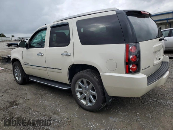 2013 GMC Yukon Denali with VIN 1GKS2EEF8DR185675, listed as a Copart auction lot 72994644 with 141,326 mi miles and Salvage Title. Bid and sale history available at carsss.com. Image 2.