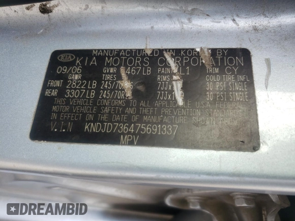 2007 Kia Sorento LX z VIN KNDJD736475691337, wystawiony jako Copart lot #57889615 z przebiegiem 279 716 mil mil oraz Szkoda całkowita • Salvage title. Historia ofert i sprzedaży dostępna na DreamBid. Obrazek 13.
