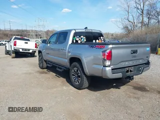 2020 Toyota Tacoma SR5 with VIN 3TMCZ5AN3LM320411, listed as a IAAI auction lot 41838498 with 50,252 mi miles and . Bid and sale history available at DreamBid. Image 3.