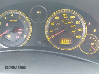 2005 Infiniti G35 z VIN JNKCV54EX5M424043, wystawiony jako IAAI lot #41937157 z przebiegiem 169 907 mil mil oraz . Historia ofert i sprzedaży dostępna na DreamBid. Obrazek 7.