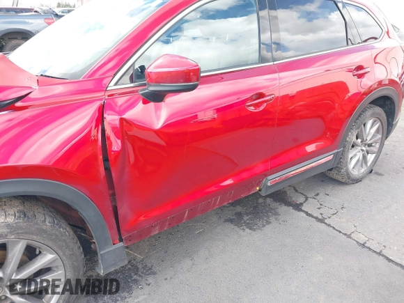 2020 Mazda CX-9 Grand Touring with VIN JM3TCBDY4L0423563, listed as a IAAI auction lot 41829394 with 76,704 mi miles and . Bid and sale history available at DreamBid. Image 19.