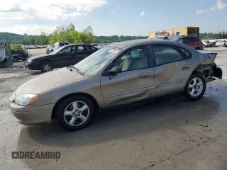 2002 Ford Taurus SE Standard z VIN 1FAFP53U92A186867, wystawiony jako Copart lot #56719905 z przebiegiem 136 323 mil mil oraz Szkoda całkowita • Salvage title. Historia ofert i sprzedaży dostępna na DreamBid. Obrazek 1.