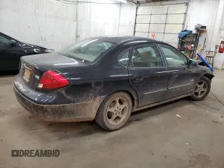 2003 Ford Taurus SEL Deluxe with VIN 1FAHP56S43A219925, listed as a Copart auction lot 76978824 with 191,000 mi miles and Salvage Title. Bid and sale history available at DreamBid. Image 3.