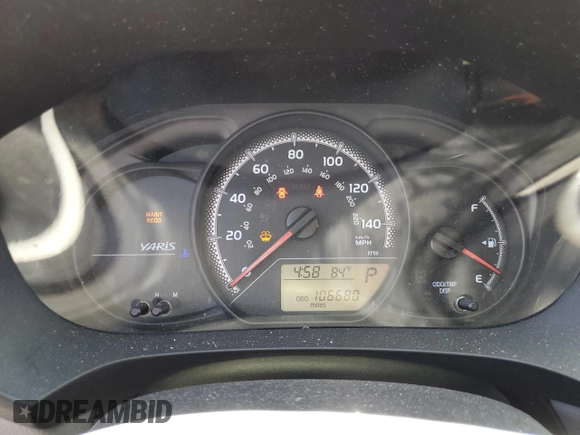 2015 Toyota Yaris L with VIN VNKJTUD34FA022097, listed as a Copart auction lot 53857825 with 106,680 mi miles and Salvage title. Bid and sale history available at DreamBid. Image 9.