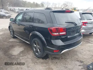 2015 Dodge Journey Crossroad with VIN 3C4PDCGG3FT599771, listed as a IAAI auction lot 41634296 with 76,547 mi miles and . Bid and sale history available at DreamBid. Image 3.