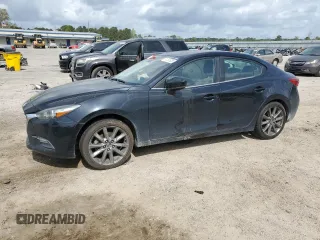 2018 Mazda 3 Touring z VIN 3MZBN1V3XJM268911, wystawiony jako Copart lot #51731825 z przebiegiem 151 921 mil mil oraz Szkoda całkowita • Salvage title. Historia ofert i sprzedaży dostępna na DreamBid. Obrazek 1.