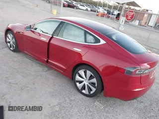 2020 Tesla Model S Long Range with VIN 5YJSA1E26LF390856, listed as a IAAI auction lot 41013728 with 54,985 mi miles. Bid and sale history available at carsss.com. Image 3.