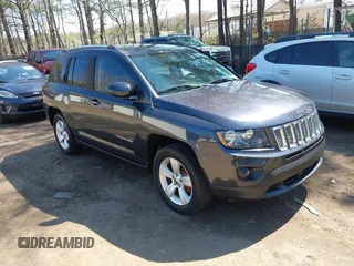 2014 Jeep Compass Latitude with VIN 1C4NJDEB3ED816351, listed as a IAAI auction lot 41882146 with 129,074 mi miles. Bid and sale history available at carsss.com. Image 1.