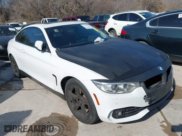 2014 BMW 4 Series 428i xDrive z VIN WBA3N9C50EF722242, wystawiony jako IAAI lot #41526322 z przebiegiem 134 254 mil mil oraz . Historia ofert i sprzedaży dostępna na DreamBid. Obrazek 1.