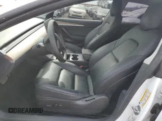 2022 Tesla Model 3 Long Range with VIN 5YJ3E1EB0NF123224, listed as a Copart auction lot 49890205 with 68,594 mi miles and Salvage Title. Bid and sale history available at DreamBid. Image 7.