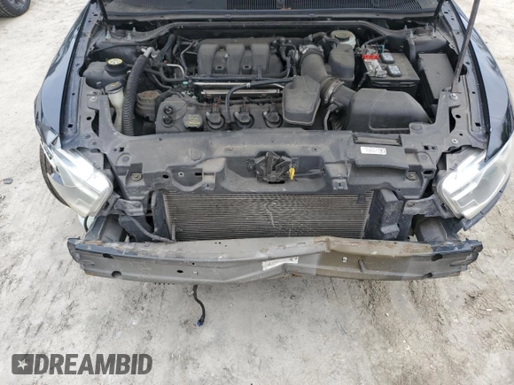 2015 Ford Taurus SE with VIN 1FAHP2D88FG136022, listed as a Copart auction lot 50944035 with 221,164 mi miles and Salvage Title. Bid and sale history available at DreamBid. Image 11.