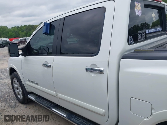 2013 Nissan Titan Pro-4X with VIN 1N6AA0EC7DN312844, listed as a IAAI auction lot 42034411 with Not Provided miles and . Bid and sale history available at DreamBid. Image 14.