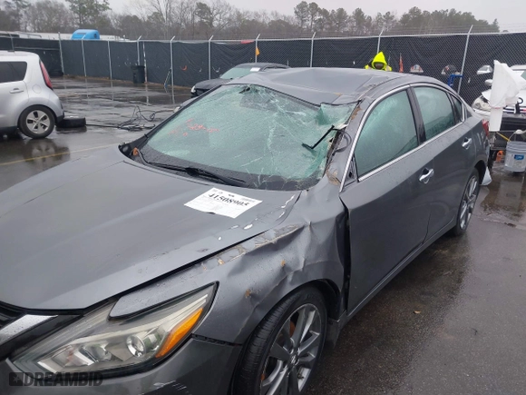 2018 Nissan Altima 2.5 SL with VIN 1N4AL3AP7JC261043, listed as a IAAI auction lot 41508905 with 186,507 mi miles. Bid and sale history available at carsss.com. Image 6.