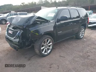 2012 GMC Yukon SLT with VIN 1GKS1CE06CR104447, listed as a IAAI auction lot 41589823 with 183,003 mi miles. Bid and sale history available at carsss.com. Image 17.