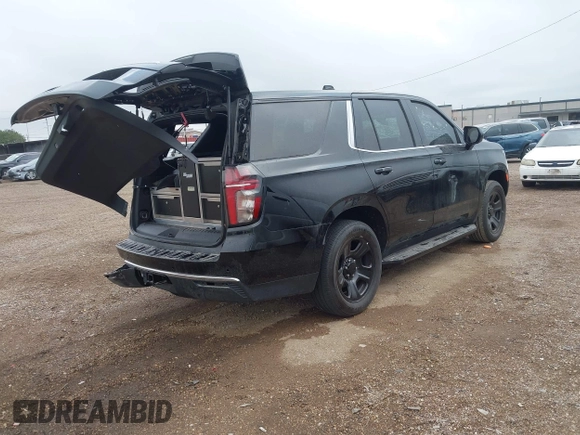 2023 Chevrolet Tahoe Commercial with VIN 1GNSKLED0PR395388, listed as a IAAI auction lot 42194028 with 10,276 mi miles and . Bid and sale history available at DreamBid. Image 4.