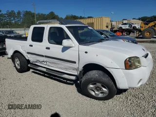 2002 Nissan Frontier SE z VIN 1N6ED27T42C319065, wystawiony jako Copart lot #74206474 z przebiegiem 147 724 mil mil oraz Szkoda całkowita • Salvage title. Historia ofert i sprzedaży dostępna na DreamBid. Obrazek 4.