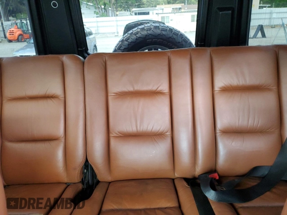 2004 Mercedes-Benz G with VIN WDCYR46E74X144672, listed as a Copart auction lot 55212454 with 143,994 mi miles and Salvage Title. Bid and sale history available at DreamBid. Image 10.