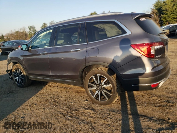 2020 Honda Pilot Touring 8-Passenger with VIN 5FNYF6H92LB031005, listed as a Copart auction lot 49545335 with 59,789 mi miles and Salvage Title. Bid and sale history available at DreamBid. Image 2.
