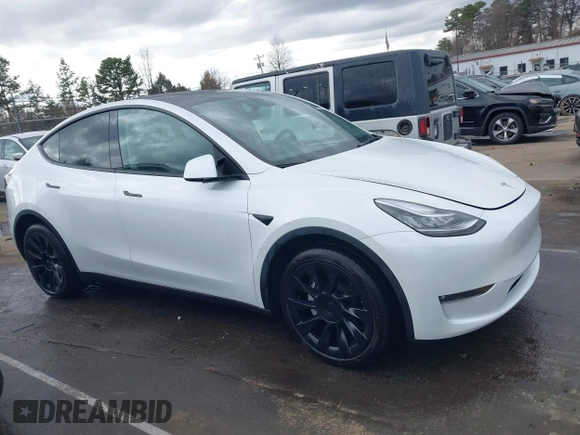 2022 Tesla Model Y Long Range with VIN 7SAYGDEE6NF461788, listed as a IAAI auction lot 41697064 with 34,034 mi miles and . Bid and sale history available at carsss.com. Image 12.